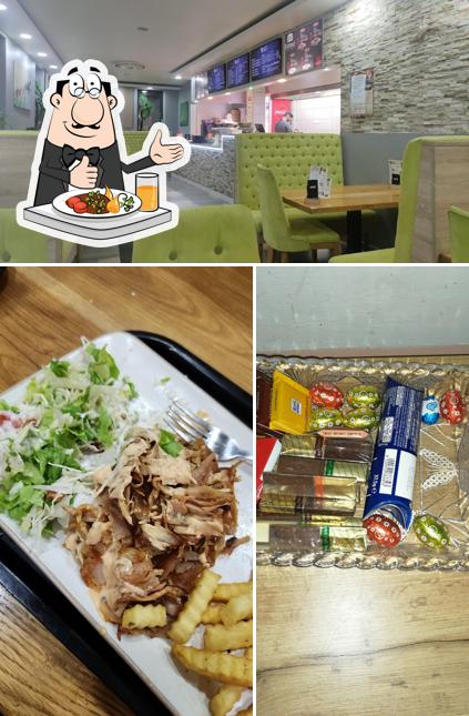 Guarda la immagine che mostra la cibo e interni di Fast Food Džimi