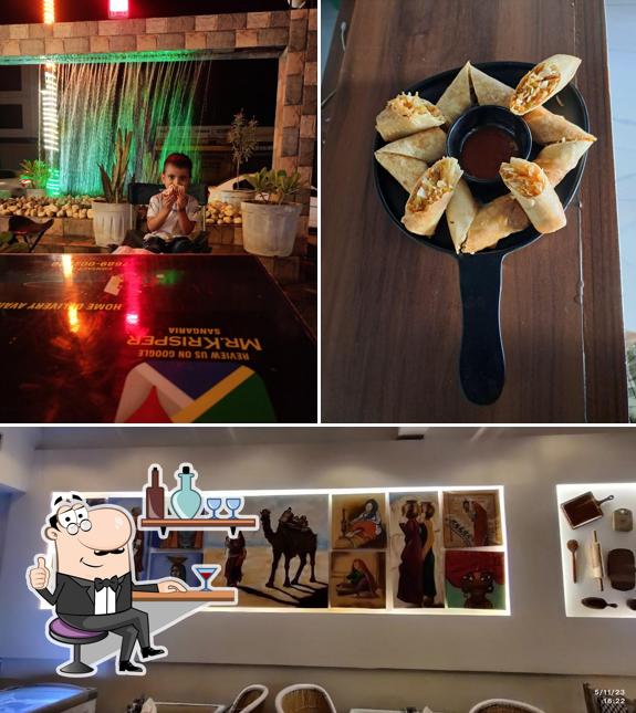 Take a look at the picture depicting interior and food at Mr. Krisper