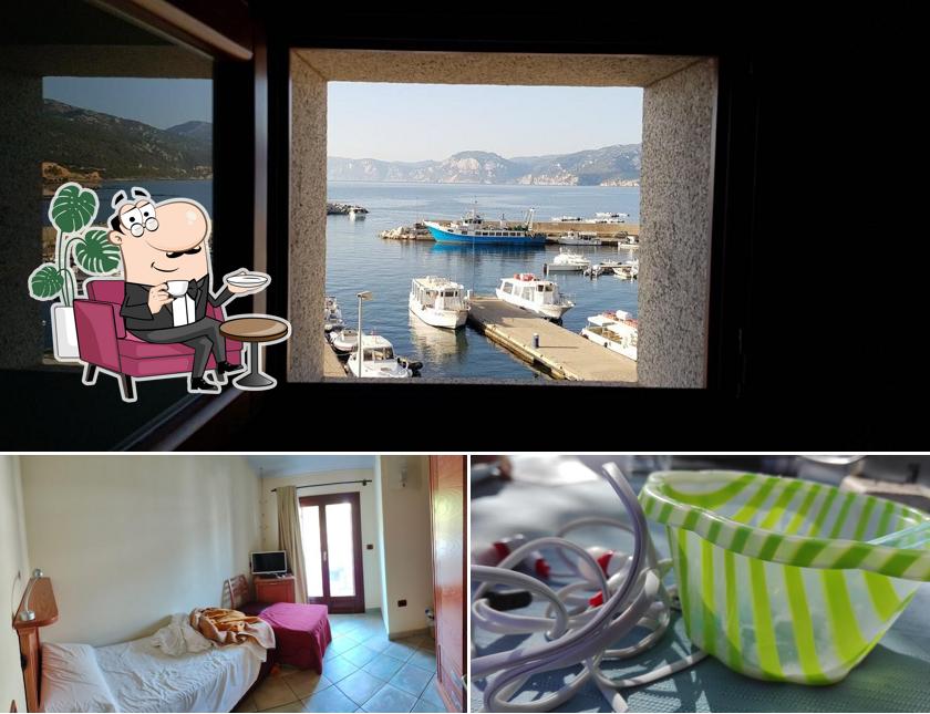 Siediti a un tavolo di Hotel ristorante Il Nuovo Gabbiano