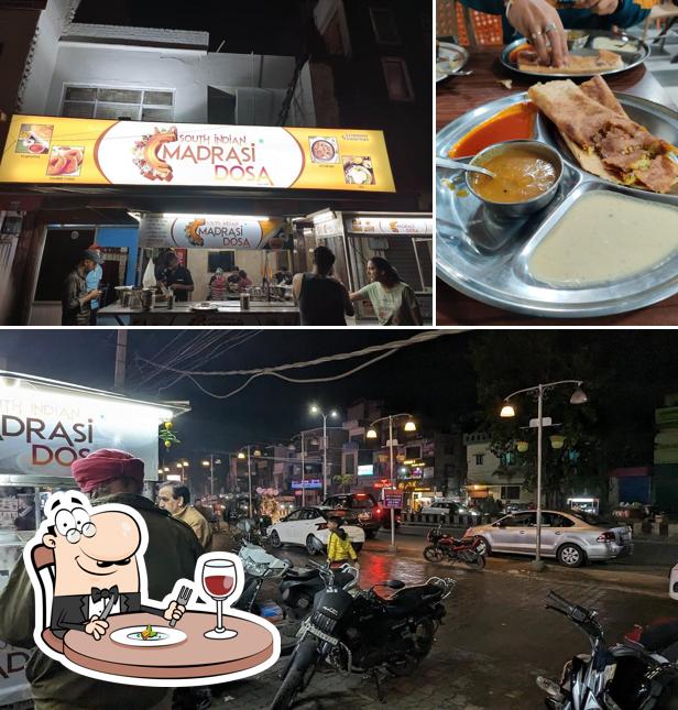 Among various things one can find food and exterior at South Indian Madrasi dosa