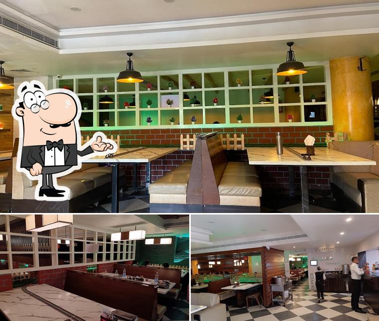 Take a seat at one of the tables at Jagavis Kritunga Train Restaurant