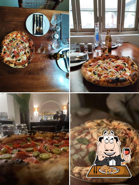 Get pizza at CALA - Curated Kitchen & Bar