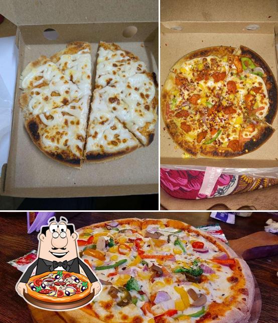 Get pizza at KHARAGPUR SOCIAL CAFE AND RESTAURANT