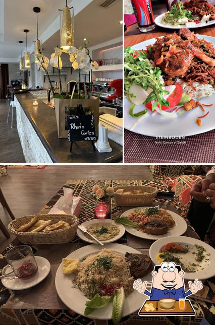 Guarda la foto che presenta la cibo e esterno di Restaurant RheinGarten