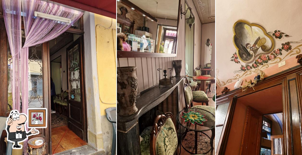 Siediti a un tavolo di Alloggio Ristorante Pizzeria di Figoni Rita