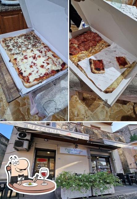 Questa è la foto che presenta la cibo e interni di Pizza Mania Artena