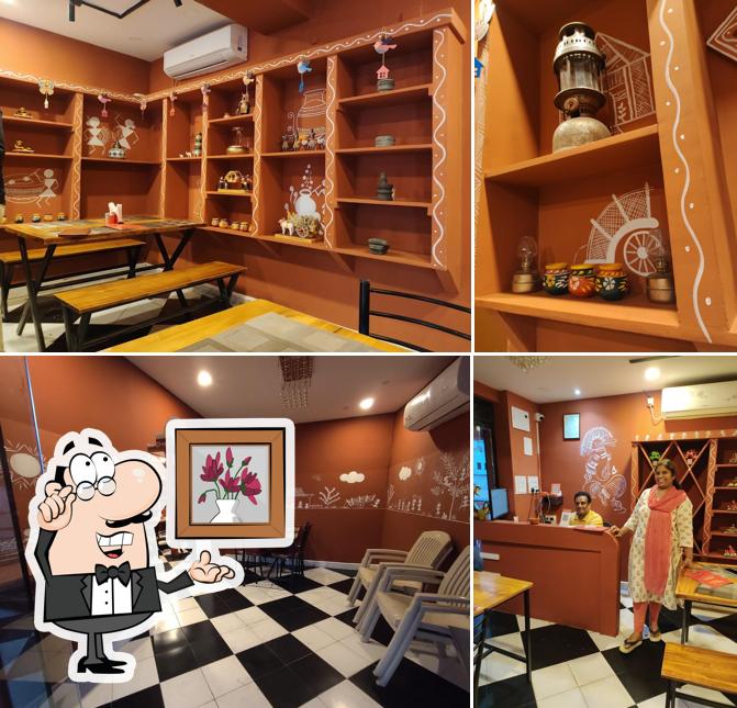 The picture of interior and drink at Raju Gari Inti Vindhu
