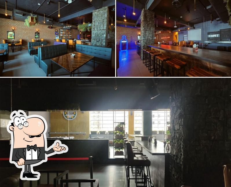 Take a seat at one of the tables at SHOUT Bar & Cafe