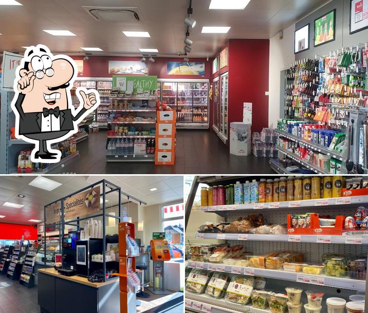 Siediti a un tavolo di AVIA Cugy - Station-service avec shop