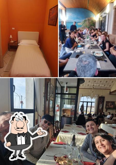 Siediti a un tavolo di L'Oste the Marin's