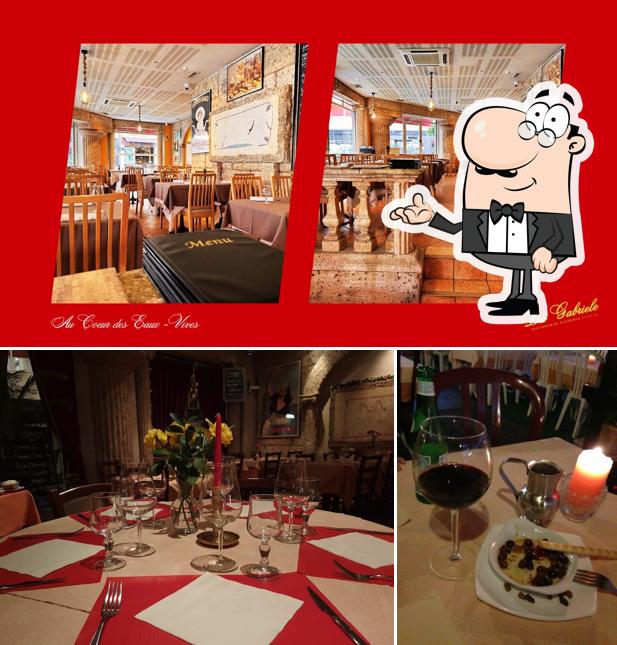 La foto di interni e tavolo da pranzo da Ristorante Pizzeria da Gabriele