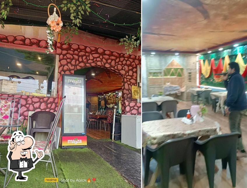 Take a seat at one of the tables at Gupshup restaurant