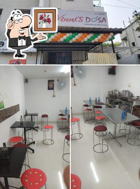 Check out the photo showing interior and food at Vidhi's Dosa