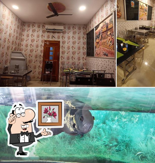Among various things one can find interior and food at MANJIL HOTEL