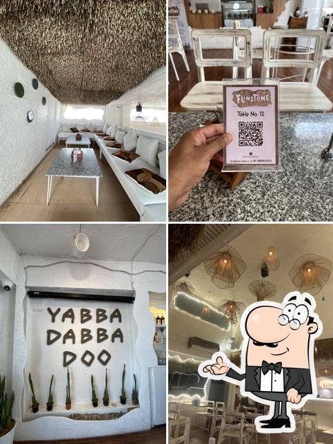 Take a seat at one of the tables at Flinstone