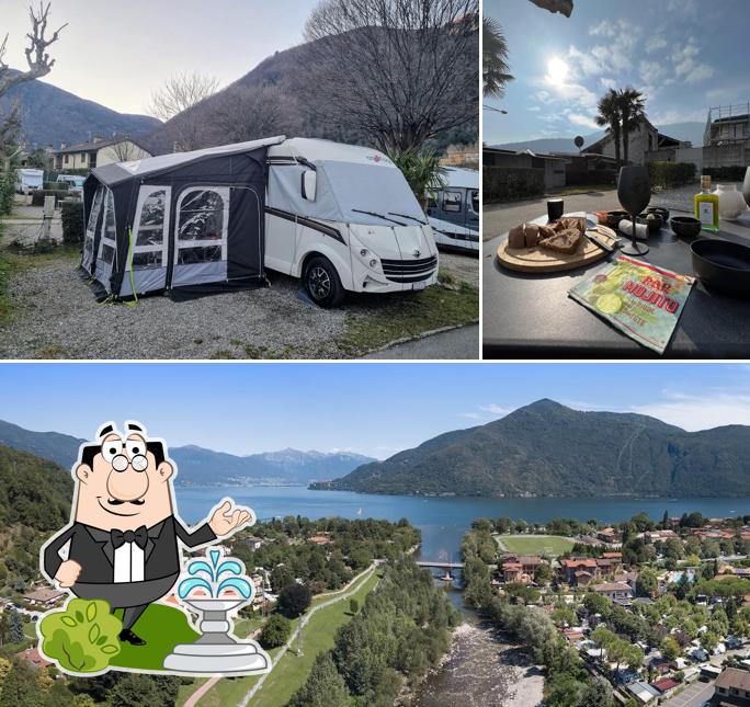 La immagine della esterno e cibo di Camping Village del Sole