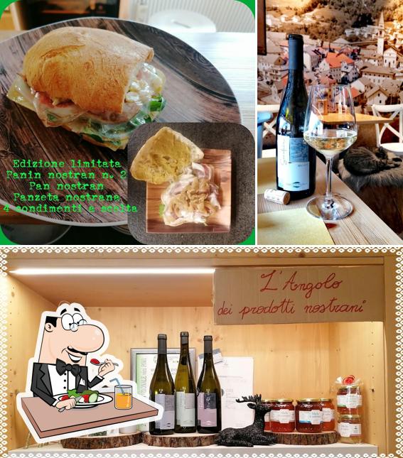Questa è la immagine che mostra la cibo e bevanda di Al Tabacchin