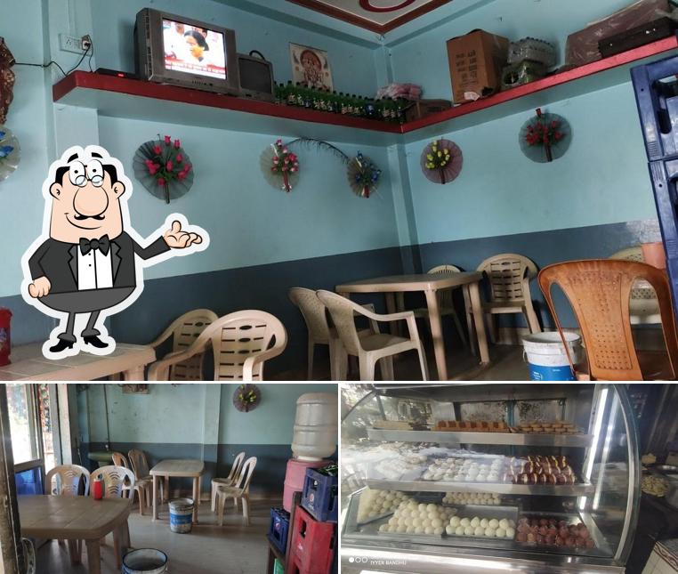 Check out the image displaying interior and food at Shree Shanker & Brothers Sweets House