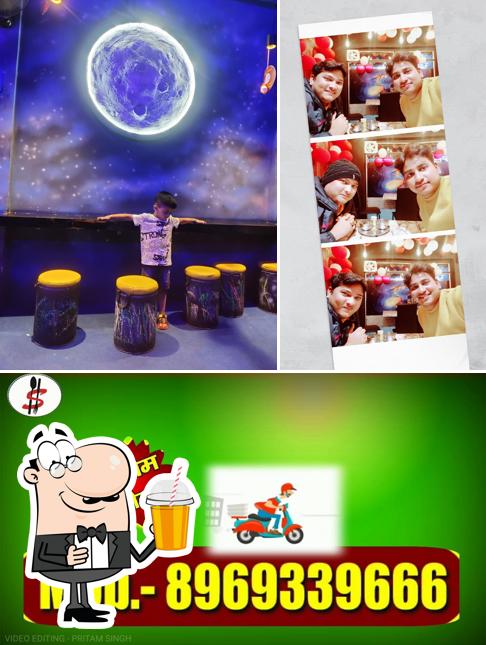 Enjoy a drink at SUNDRAM ROLL'S