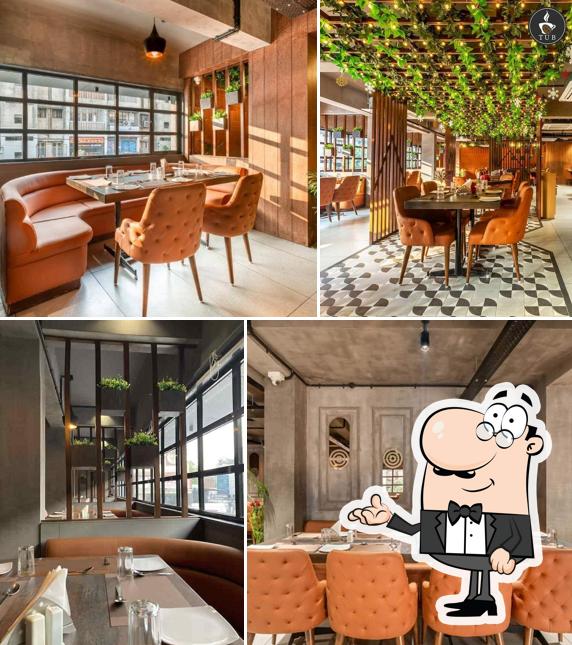 Take a seat at one of the tables at Anjoy