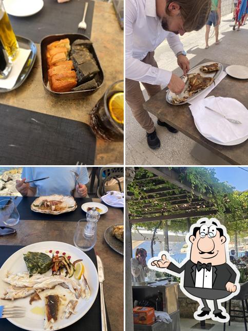 Siediti a un tavolo di La Villa Restaurant