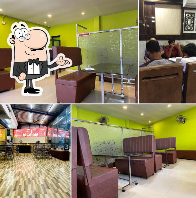 Take a seat at one of the tables at Bee yea family restaurant