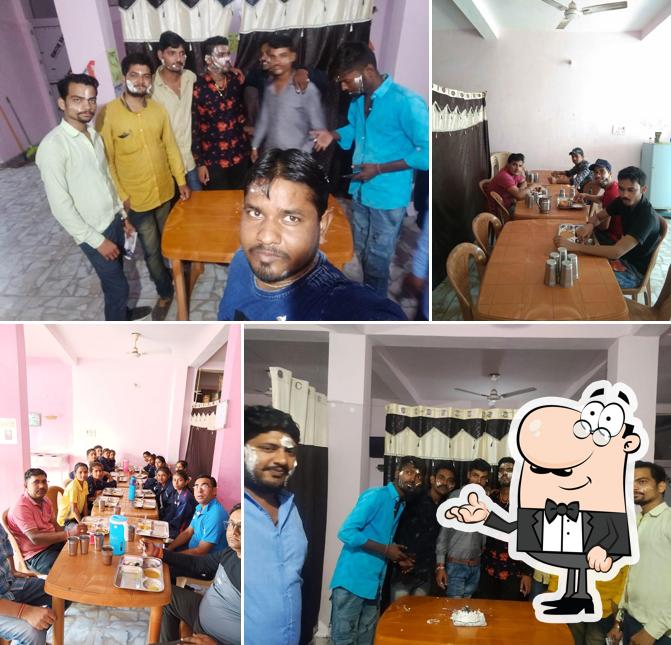 Take a seat at one of the tables at Indian Mess & Tifin Center