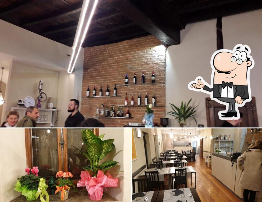 Siediti a un tavolo di Ristorante Pizzeria Cinema Americano