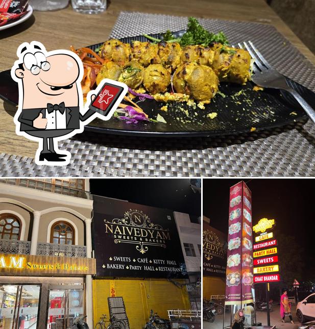 The image of exterior and food at Shri Naivedyam Sweets & Bakers