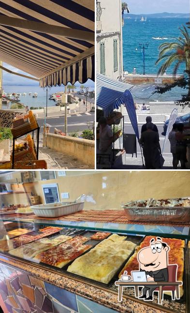 Dai un'occhiata agli interni di Pizzeria Rosticceria Il Muretto