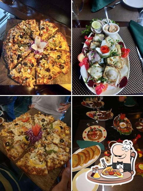 Pick pizza at Colonel's Cabin