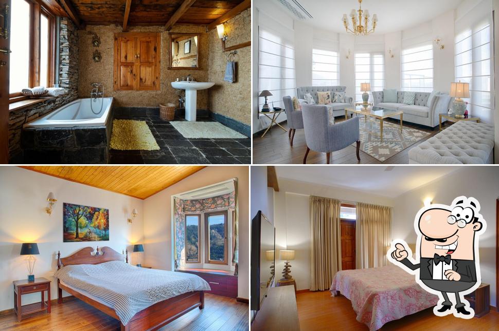 Take a seat at one of the tables at The Manor Luxury Apartments, Shimla