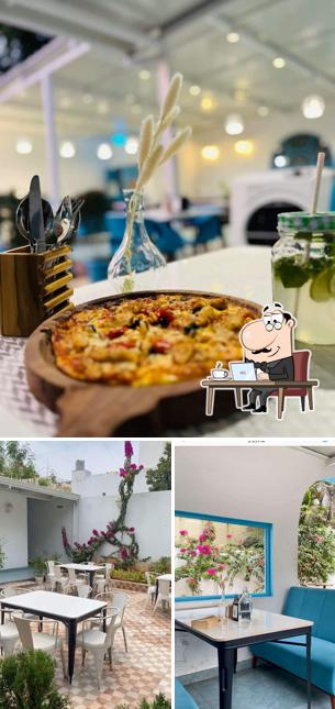 Take a seat at one of the tables at Bluebrick Cafe