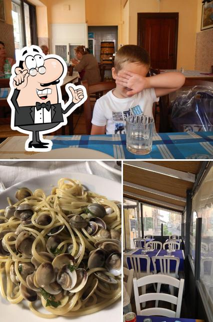 Siediti a un tavolo di Trattoria Da Carlo