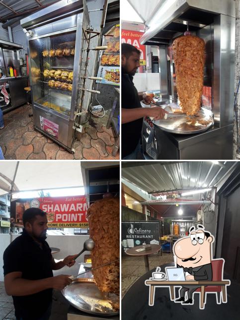 Take a seat at one of the tables at Shawarma Point