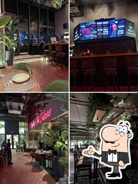 Take a seat at one of the tables at Bira 91 Taproom- CP67 Mall Mohali