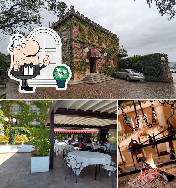 Puoi goderti l'aria fresca da seduto all'esterno di Ristorante Al Castello