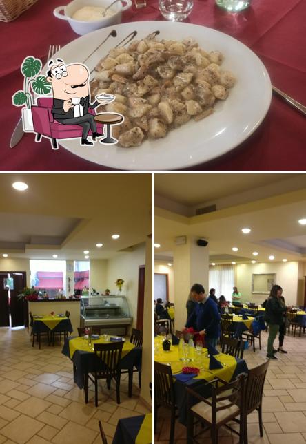 Questa è la immagine che mostra la interni e cibo di Ristorante La Corte Dei Re