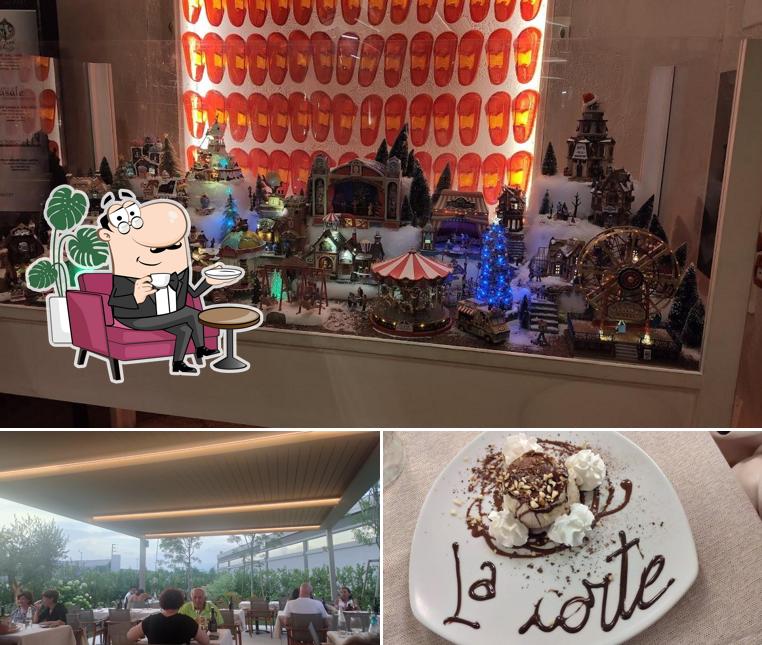 Siediti a un tavolo di Hosteria La Corte