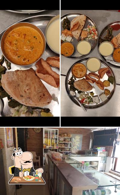 This is the photo showing food and interior at Poonam Sweet And Farsan