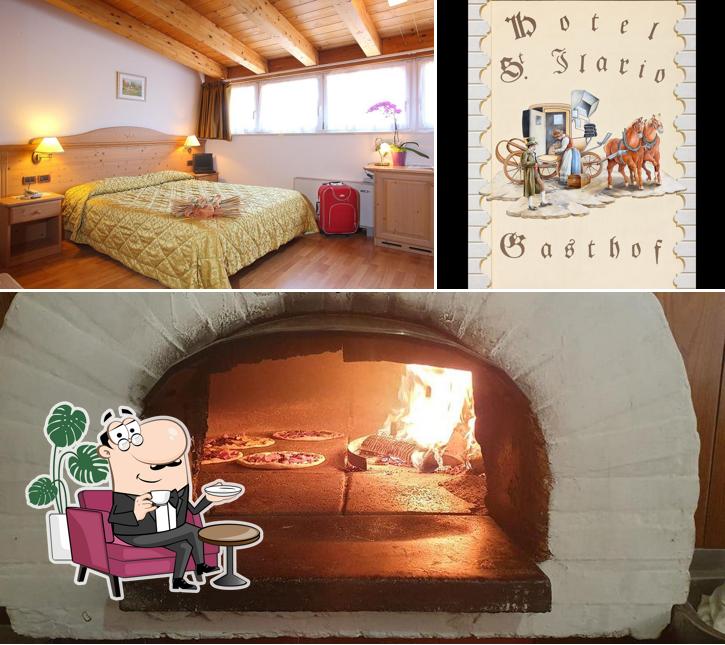 Siediti a un tavolo di Hotel Sant'Ilario