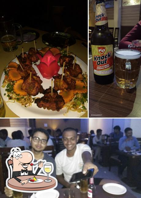 Check out the picture depicting food and interior at Priya Bar & Restaurant
