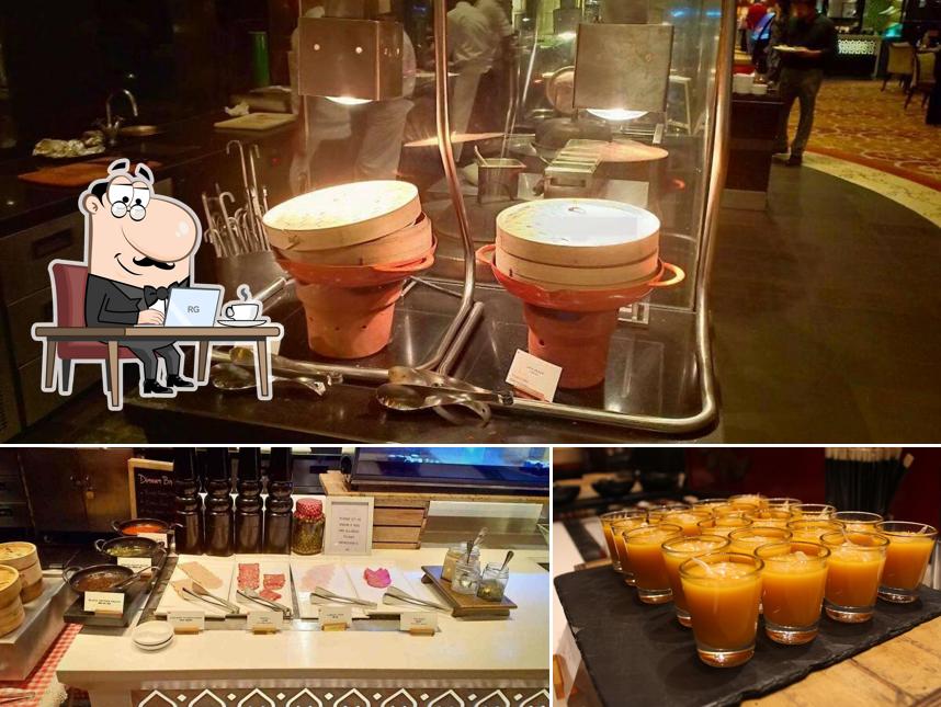 Check out the picture showing interior and beverage at PONDICHÉRY CAFÉ - ALL-DAY DINING