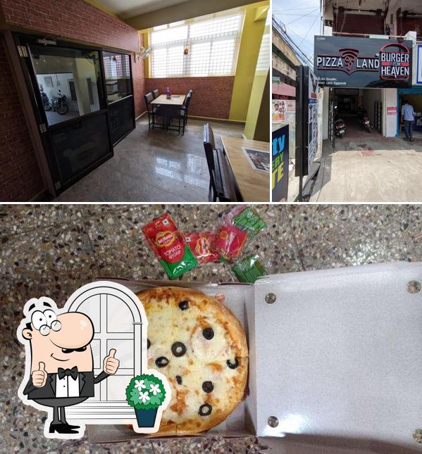 Take a look at the picture depicting exterior and pizza at pizzaland (Hand made pizza)