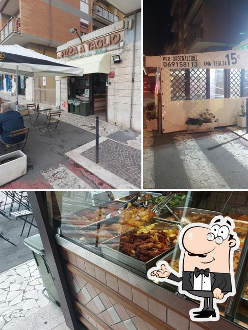 Questa è la foto che mostra la interni e cibo di Pizzeria di Vivarelli Stefano