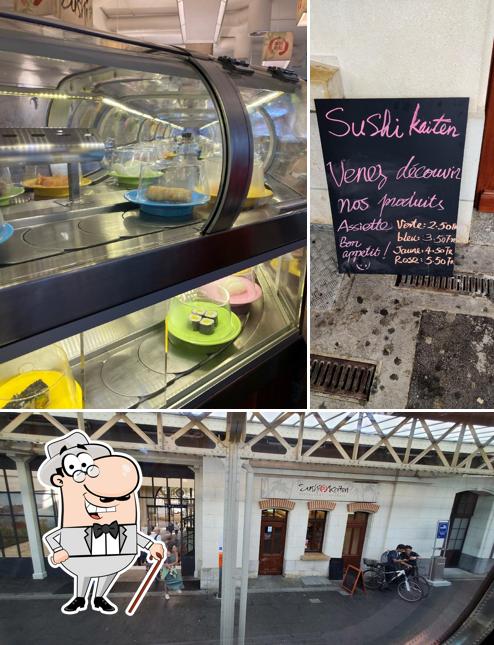 La immagine della esterno e lavagna di Sushi Kaiten