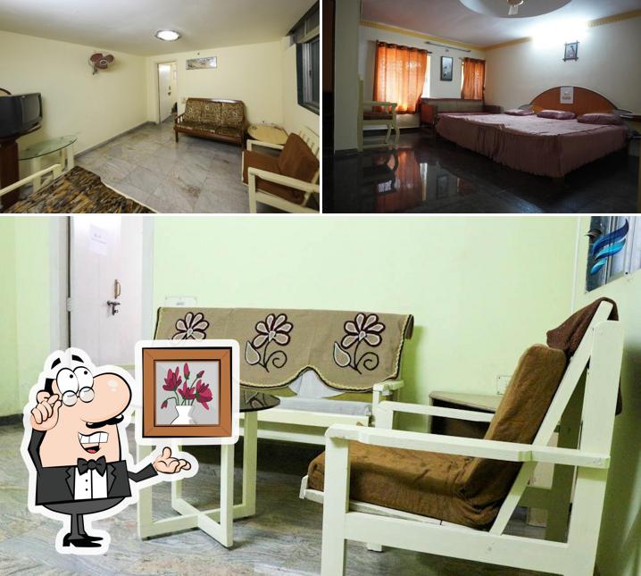 Take a seat at one of the tables at Hotel Hornbill