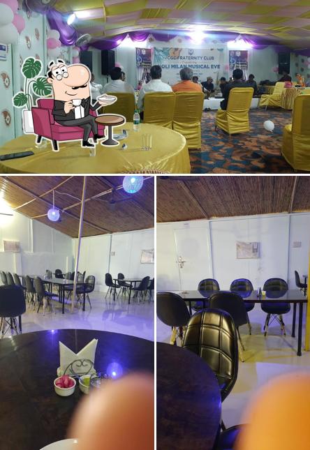 Take a seat at one of the tables at Milkbaar Parag Fast Food Restaurant