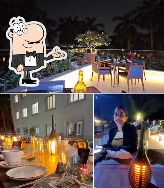 Take a seat at one of the tables at Spice Terrace Restaurant