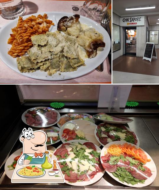 Dai un’occhiata alla foto che presenta la cibo e esterno di Con sapore Conad